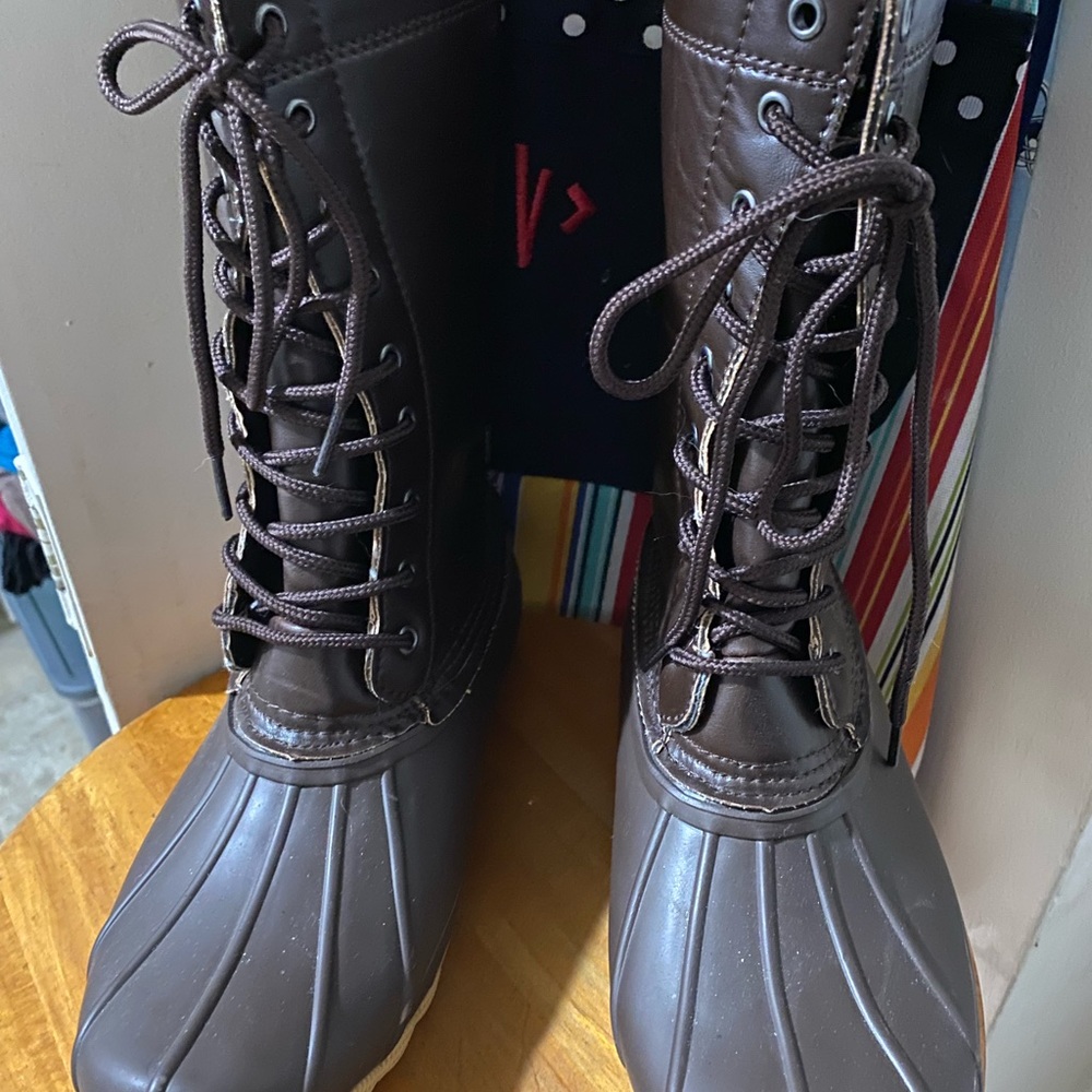 Tall brown lace-up duck boots